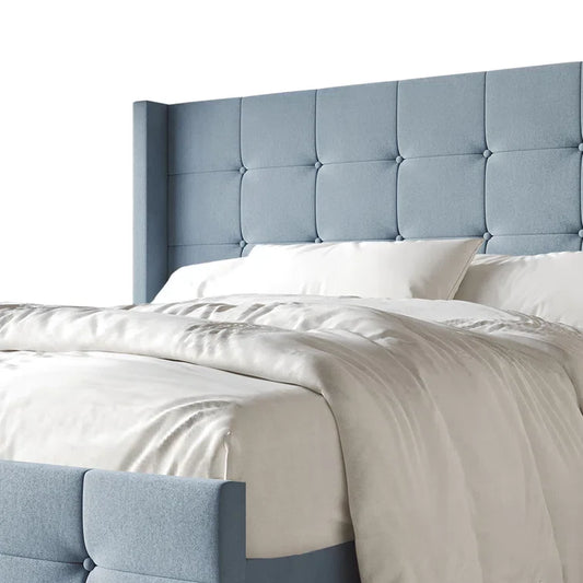 Karmane Upholstered Wingback Bed