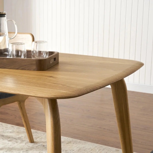 Vincent Solid Oak Dining Table – Modern Curved Edge Design for Contemporary Spaces